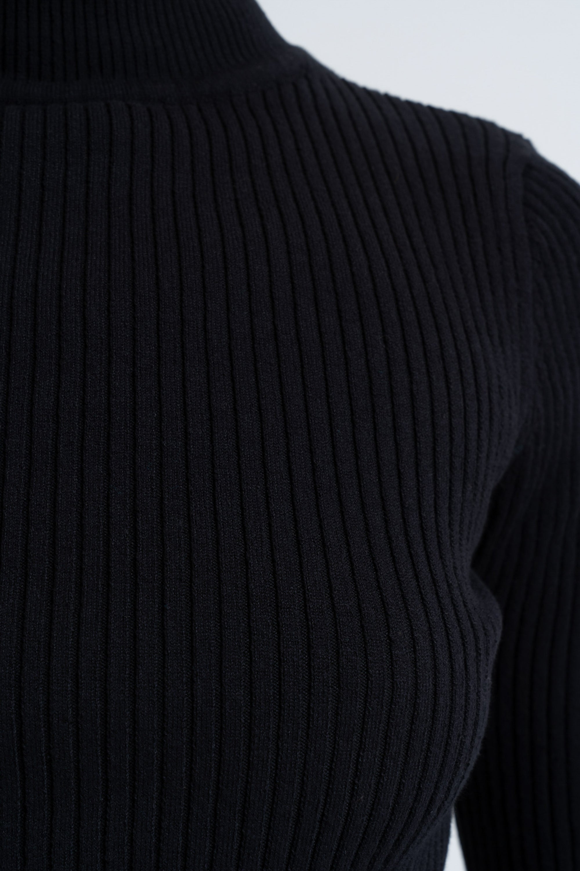 Arthur Apparel Black Fitted Mock-Neck Skivvy with Raw Hem in Cotton Rib Knit