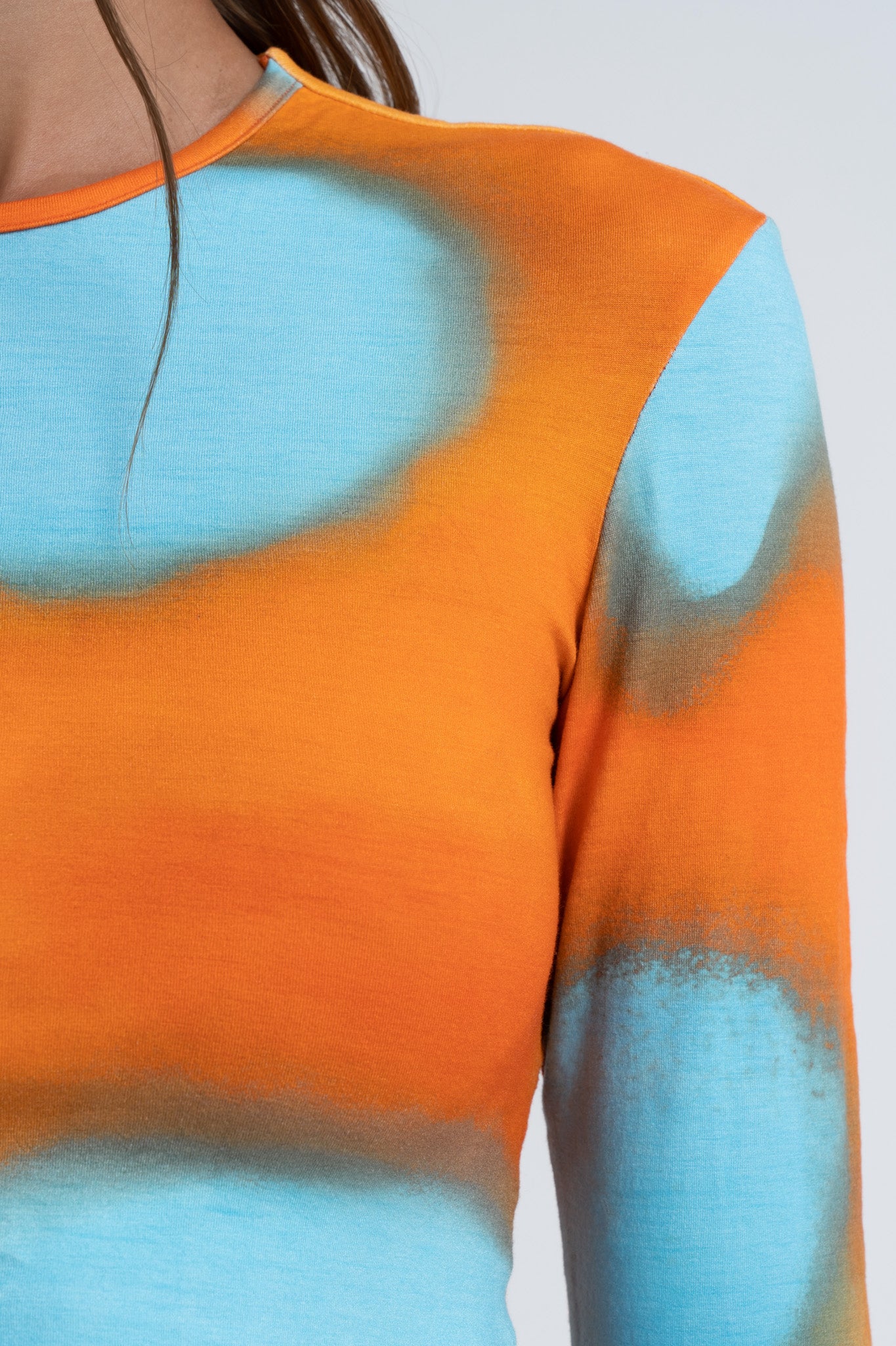Arthur Apparel Orange Blue Prints Cotton Long Sleeve Crop Top with Cutout Back